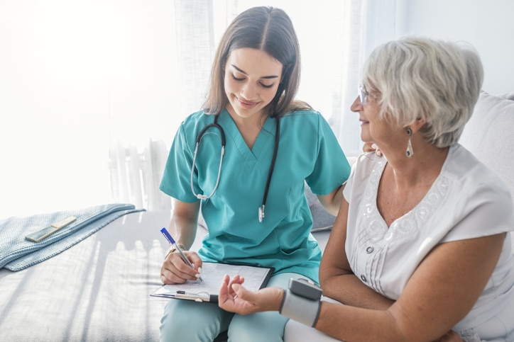 Older person is having blood pressure checked