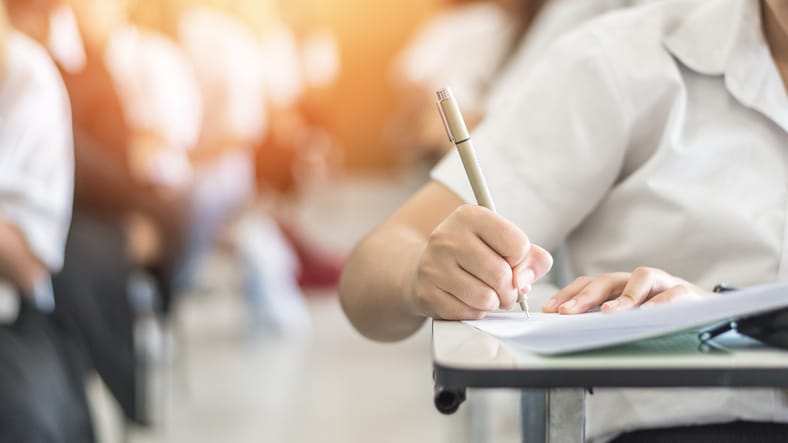 Exam with school student in the exam room