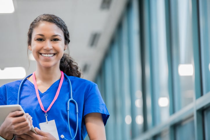 Nurse holding electronic patient chart